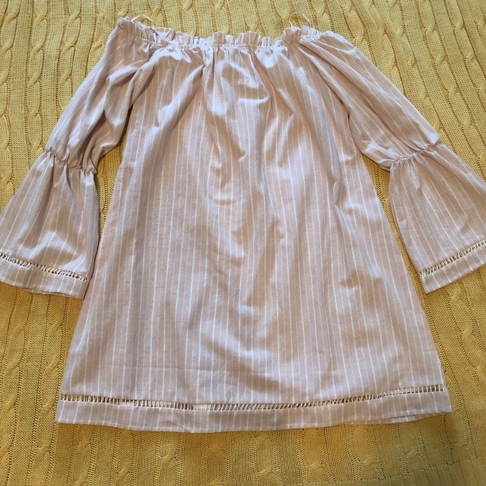 Off the shoulder dress.